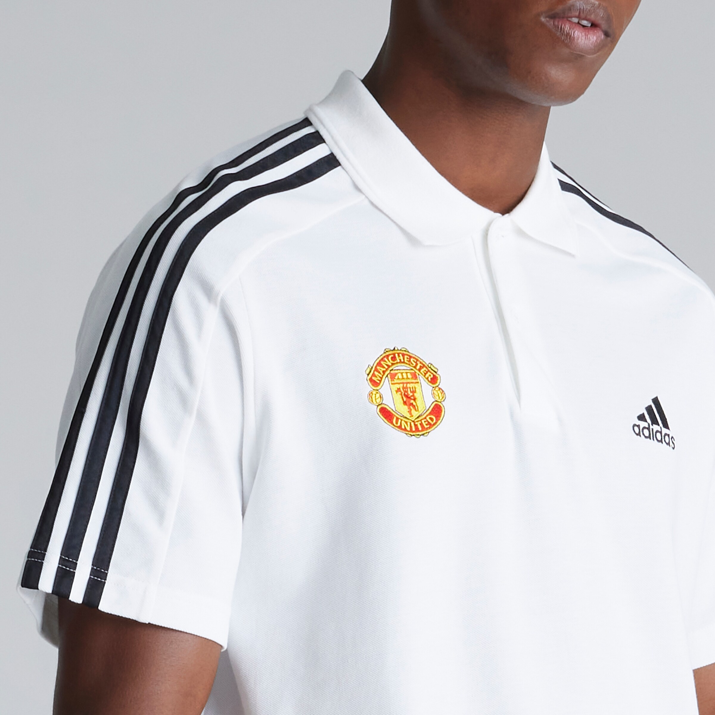 Manchester United x adidas Essentials Piqué Embroidered Small Logo 3-Stripes Polo Shirt White White Detail [5-5]